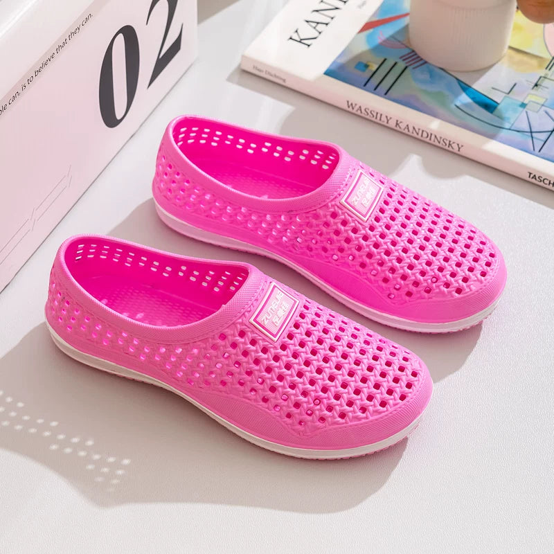 Vaaleanpunainen rei'itetty slip-on loaferi pari sivulta — Helvenza